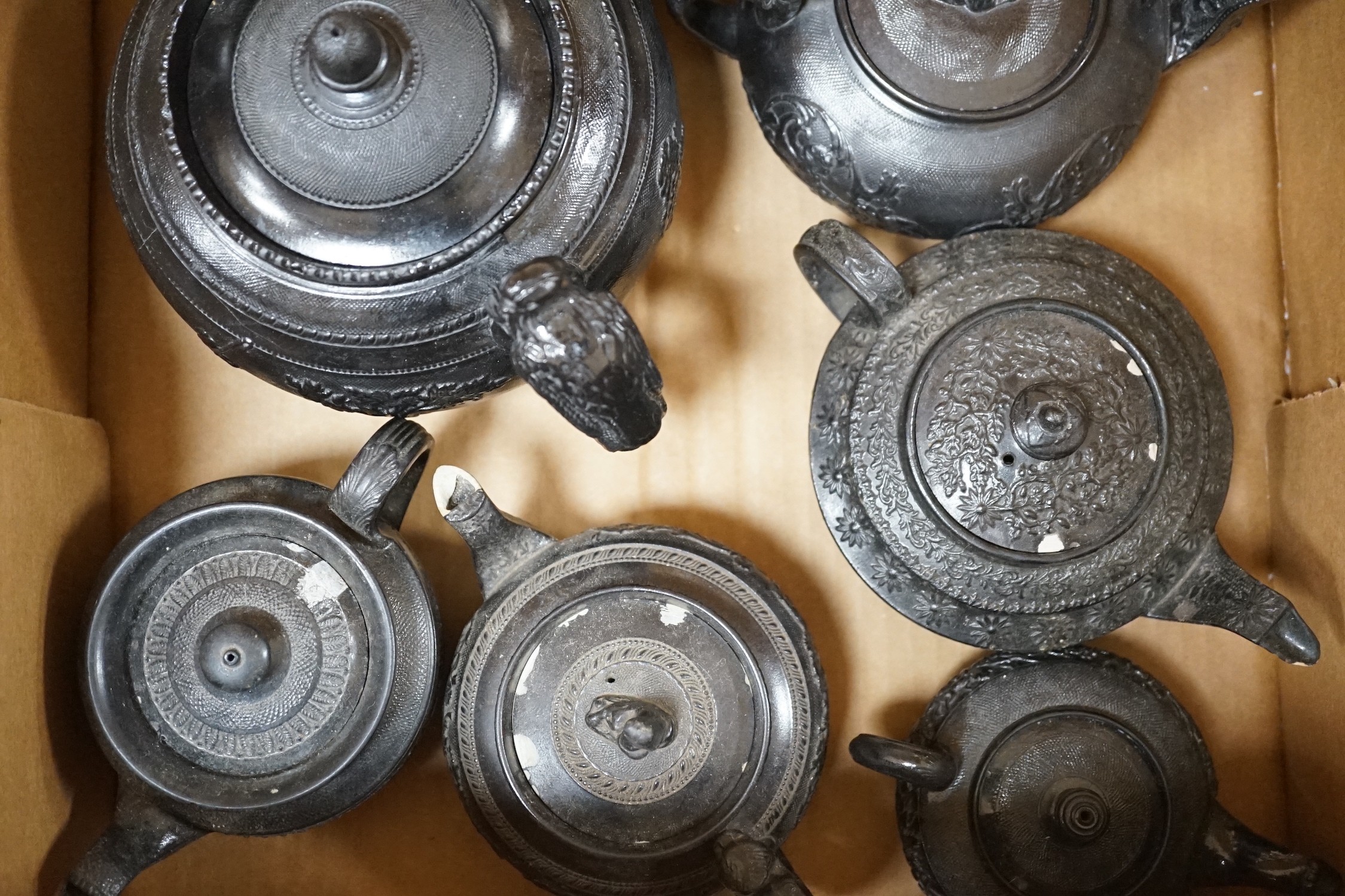 A selection of Jackfield type black glazed teapots, 19th century